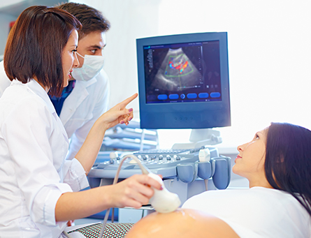 gynecologists helping woman understand the ultrasound